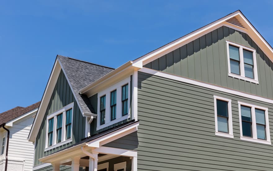 Grey lap and board-and-batten siding on a two-story home